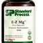 Image of E-Z Mg bottle next to tablets of magnesium supplements.
