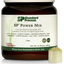 Tub of SP Power Mix next to a scoop of the green powder.